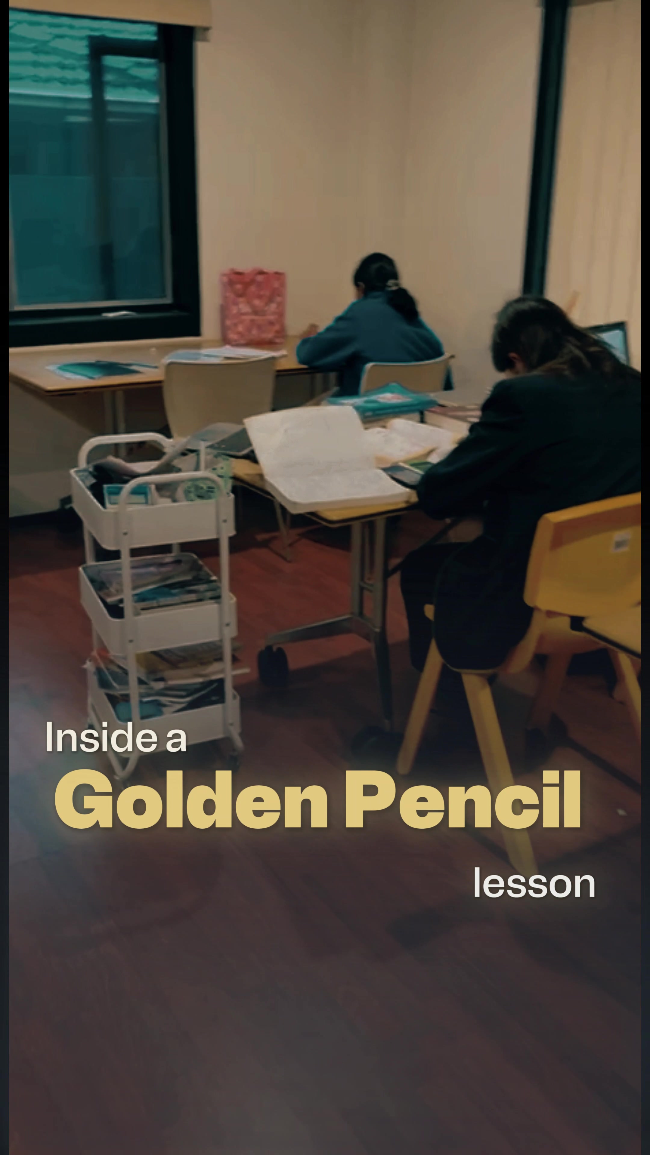 Golden Pencil tutor teaching students in a classroom